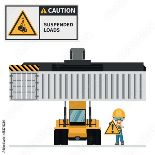 Reach stacker loading container. Port machinery. Container carrier. Warning Overhead load. Work accident. Worker with personal protective equipment. Industrial safety and occupational health at work