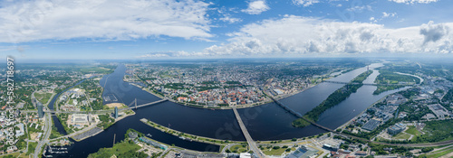 Riga Old Town and Dauguva River In Foreground. Drone Point of View. Latvia