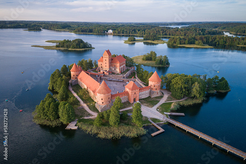 Trakai Castle with lake and forest in background.  Lithuania. photo