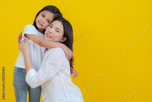 Picture of mother and little daughter showing love.