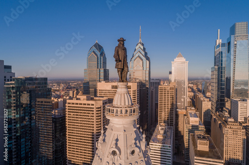 Statue of William Penn. William Penn is a bronze statue by Alexander Milne Calder of William Penn. It is located atop the Philadelphia City Hall, Pennsylvania. photo