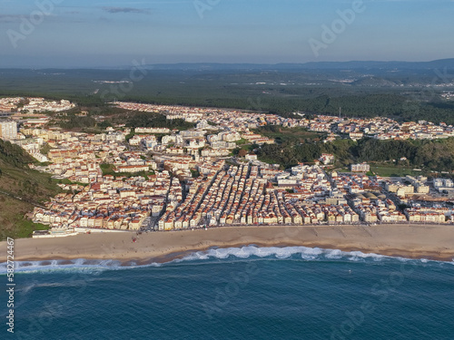 Nazare Town in Portugal. Beach and Cityscape. Drone Point of view.