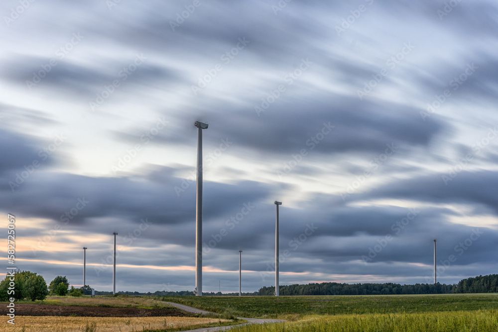 Windmill in Nature. Blurry Cloudy Sky. Long Exposure. Beautiful Nature