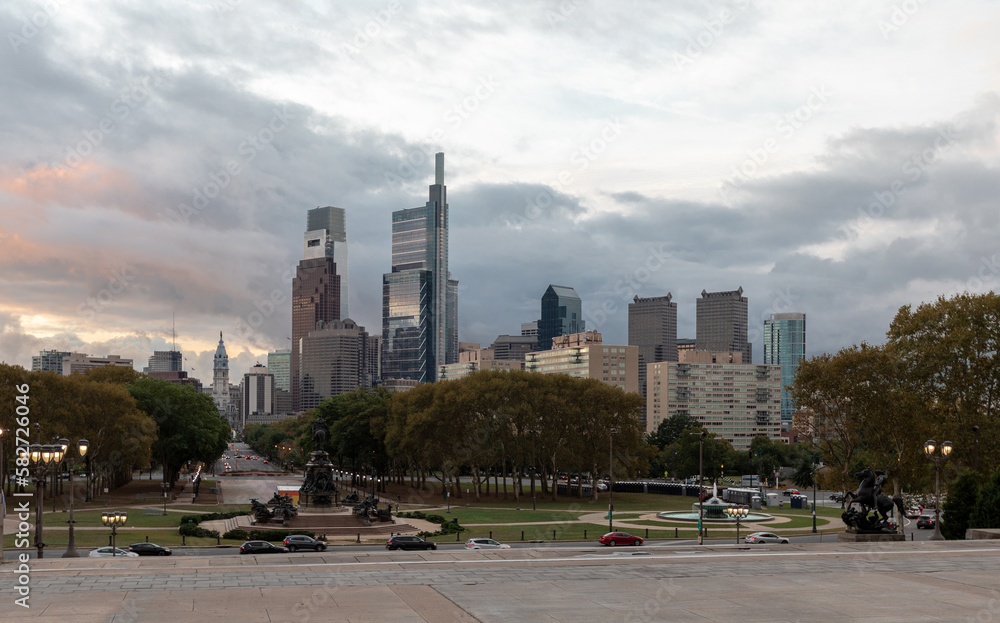Fototapeta premium Philadelphia City Center and Business District Skyscrapers. Pennsylvania. Cloudy Blue Sky. Philadelphia Downtown. Morning Traffic in Background