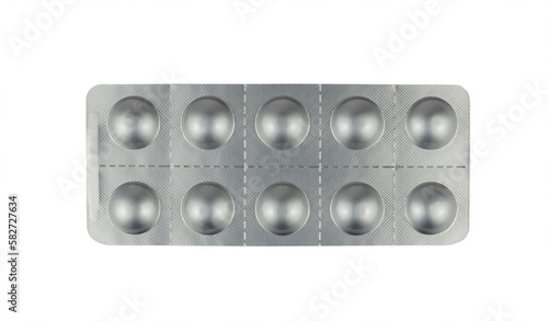 Tablets in a silver blister package isolated from background