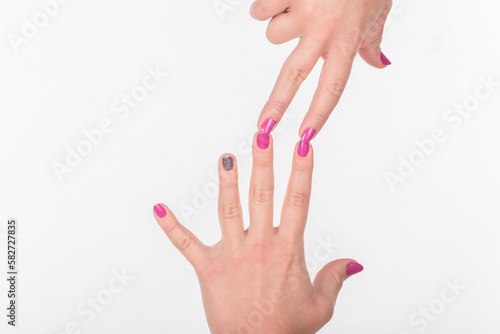 Woman Hand with Polish Fingers on White Background. Connected Two Hands.
