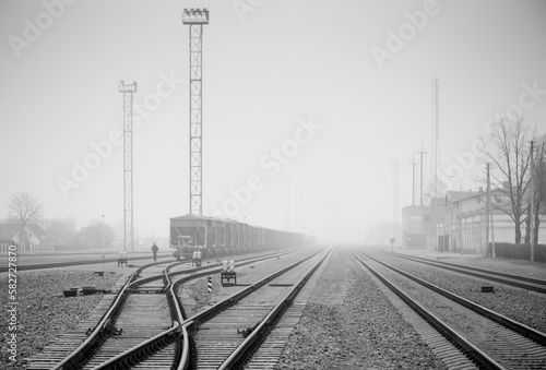 Railroad in Misty Landscape. Mazeikiai City in Lithuania.
