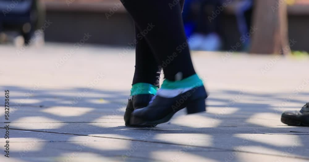 Close up slow motion shot of the shoes of Irish dance in Myriad Botanical Gardens at Oklahoma Close up slow motion shot of the shoes of Irish dance in Myriad Botanical Gardens at Oklahoma