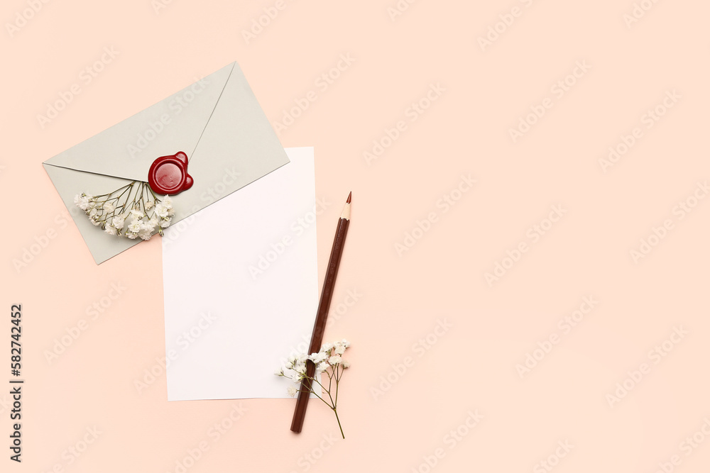 Composition with blank card, envelope, pencil and gypsophila flowers on color background