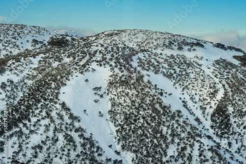 Mountains covered in snow at Mt Hotham photo