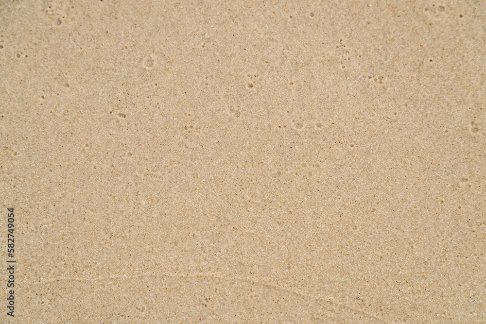 beach sand wet nature texture background. top view. copy space. beach sand wet nature texture background. top view. copy space.