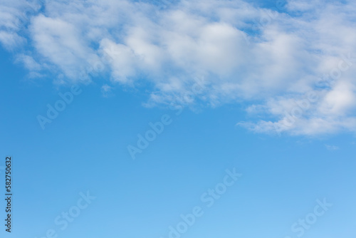 High-quality blue sky with a few white clouds - perfect for sky replacements