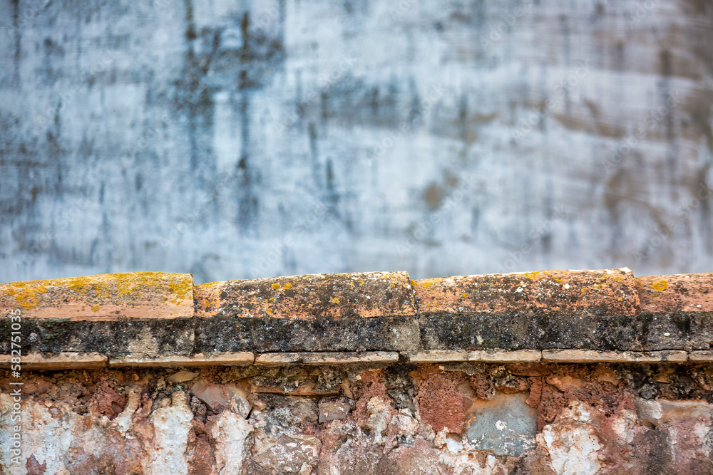 Distressed and Weathered House Wall Against Grey Background for Textures and Backgrounds Distressed and Weathered House Wall Against Grey Background for Textures and Backgrounds