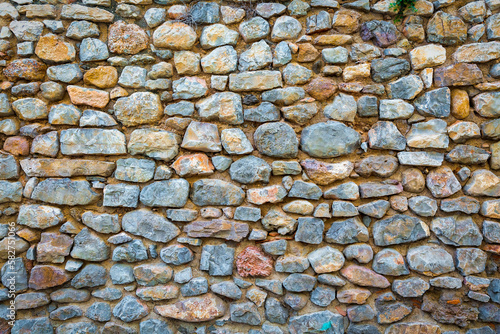 Texture of historic stone wall from city wall for backgrounds and presentations