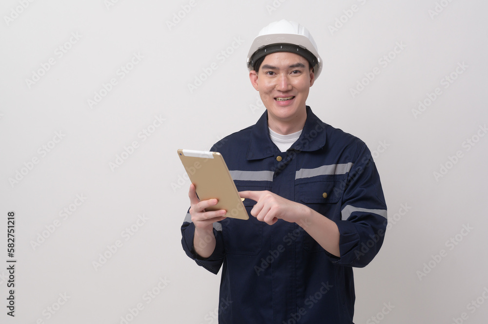 Portrait of male engineer wearing a protective helmet over white background studio. Portrait of male engineer wearing a protective helmet over white background studio.