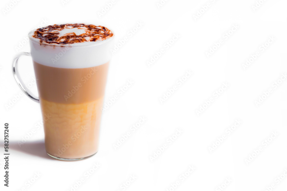 Latte macchiato in a tall glass on a white background. Cafe latte layered with milk in a high drinking glass. Minimalism. Сopy space Latte macchiato in a tall glass on a white background. Cafe latte layered with milk in a high drinking glass. Minimalism. Сopy space