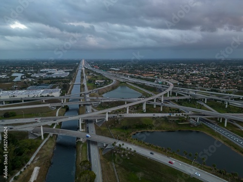 Wallpaper Mural Aerial view of crossing highway roads above Florida during the sunrise Torontodigital.ca
