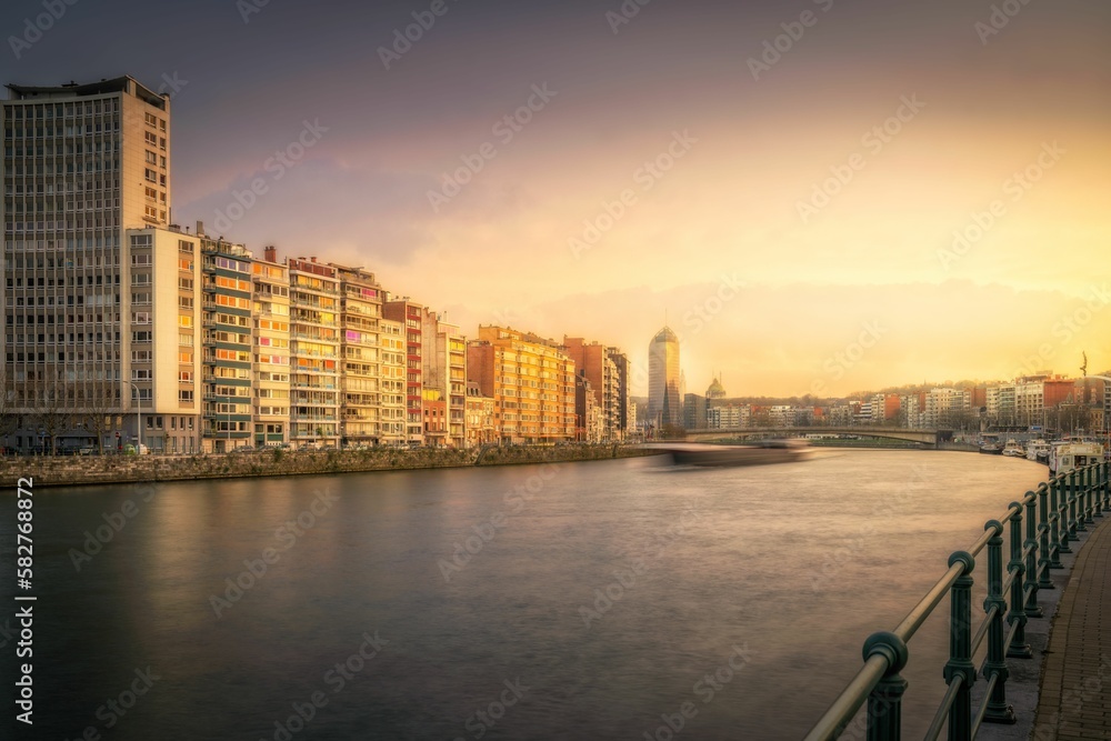 Scenic view of the Meuse river passing through the city of Liege, Belgium