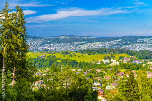 Houses and forests with meadows in Langnau am Albis, Horgen, Zurich, Switzerland photo