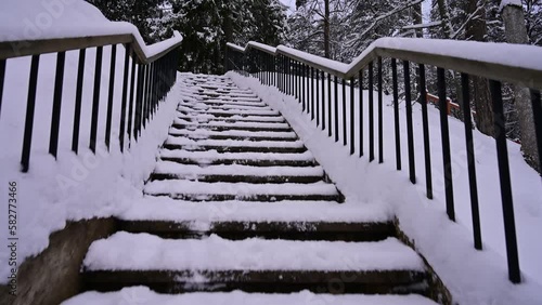 Going up to the second level from the snowy stairs.