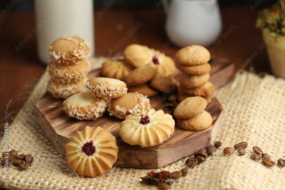 Closeup of delicious cookies of wooden board Closeup of delicious cookies of wooden board