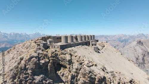 High-position gradually zooming out view of ruined artillery batteries in Mont Chaberton peak photo