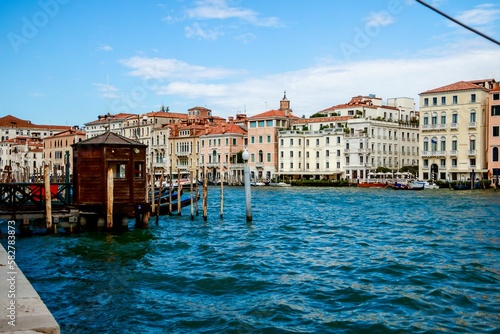 Beautiful shot of historic buildings on the canal shore in Venice, Italy