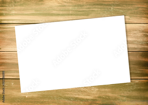 Empty white list on an old style wooden empty background photo