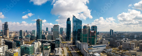 Warszawa, panorama miasta. Widok z drona. Niebieskie niebo i chmury.  #582794074