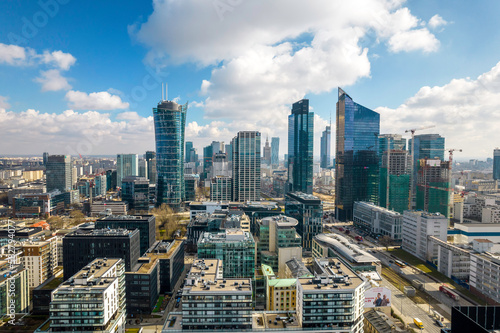 Warszawa, panorama miasta. Widok z drona. Niebieskie niebo i chmury.  #582794077