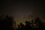 Sky full of stars over the mountains. No light pollution. Dark sky park. Bieszczady Mountains, Poland.