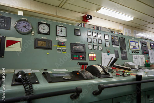 Interior of ship's engine room control compartment. The control instruments of the ship's engine.