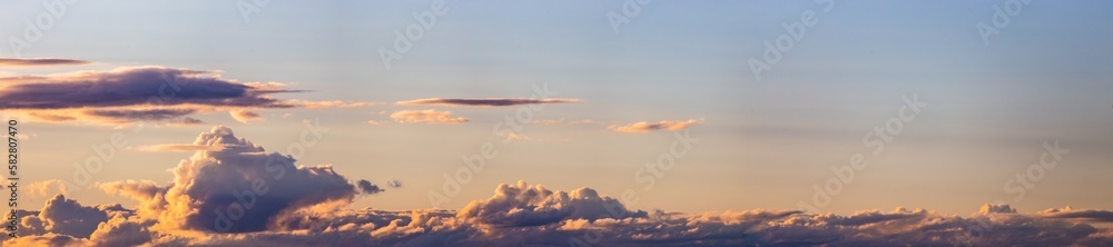 Sky panorama. Beautiful dramatic big clouds in the sky. Landscape of the power of heaven and nature. Copy space