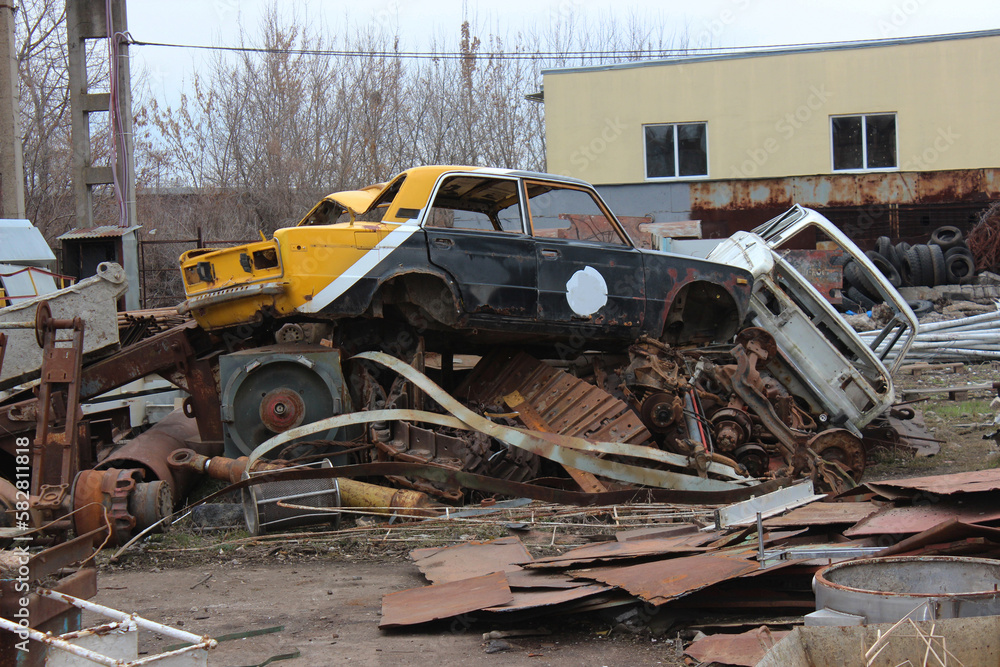 Obraz premium A pile of scrap metal before recycling. Open air
