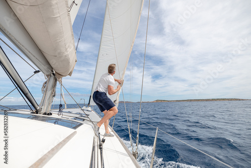 Man setting sail on his boat or yacht