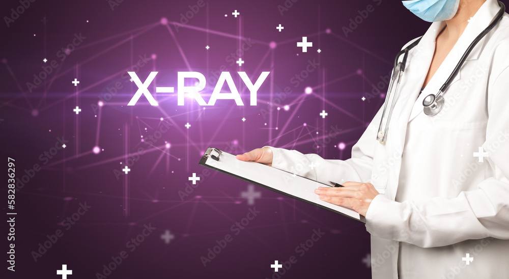 Doctor fills out medical record Doctor fills out medical record