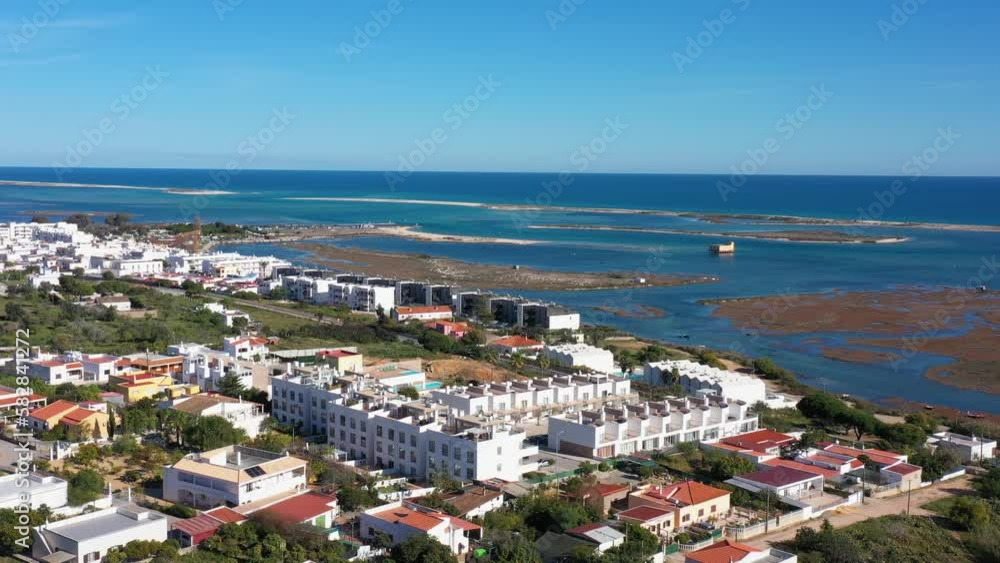 Spectacular aerial views of the Ria Formosa and Fuzeta, a touristic residential area. Spectacular aerial views of the Ria Formosa and Fuzeta, a touristic residential area.