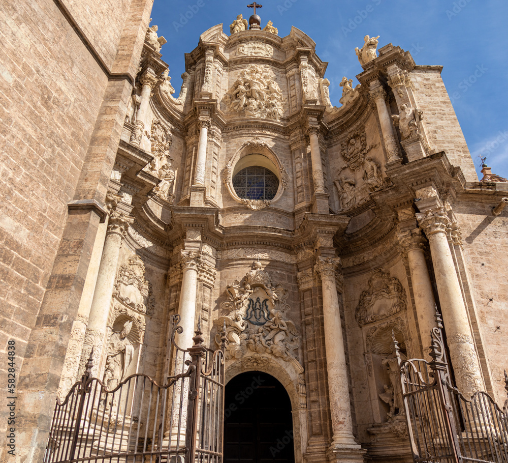 Main door of the Cathedral of Valencia, called the iron gate for the iron fence that surrounds the entrance atrium. Baroque style.