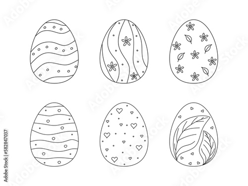 Set of Easter eggs in doodle style. Hand drawn decorative eggs in linear style isolated on white background. Happy easter. Vector illustration