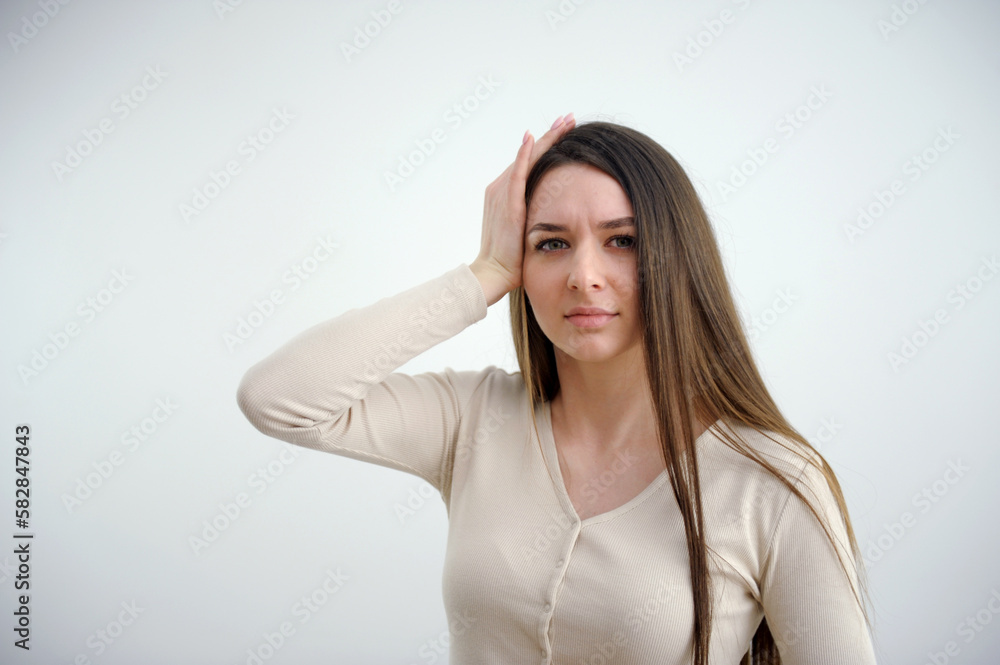 headache cute woman holding her head with her eyes closed cold treatment medicines place for text on a white background workdays Woman with headache rubbing temples. High quality photo headache cute woman holding her head with her eyes closed cold treatment medicines place for text on a white background workdays Woman with headache rubbing temples. High quality photo