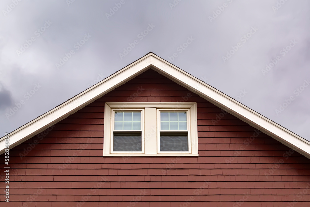 Gable house roof attic window exterior view, Boston city, MA, USA