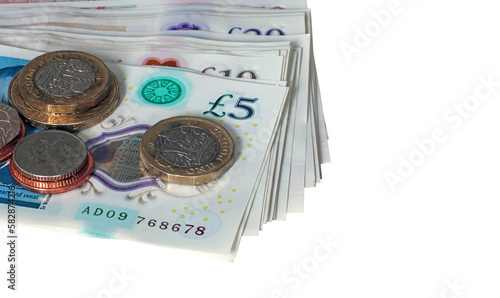 Pile of sterling notes and coins.