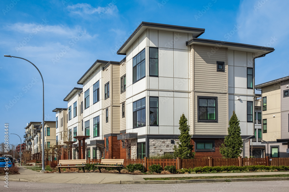 Fototapeta premium New residential townhouses. Modern apartment buildings in Canada. Modern complex of apartment buildings