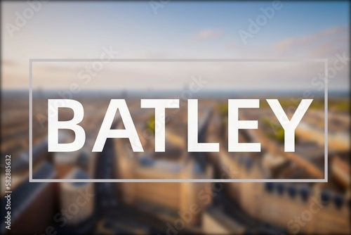 Batley: Der Name der britischen Stadt Batley in der Region Kirklees vor einem Hintergrundbild photo