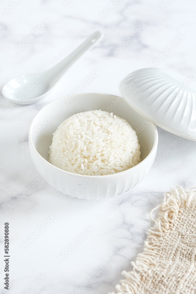 cooked rice in white ceramic bowl cooked rice in white ceramic bowl