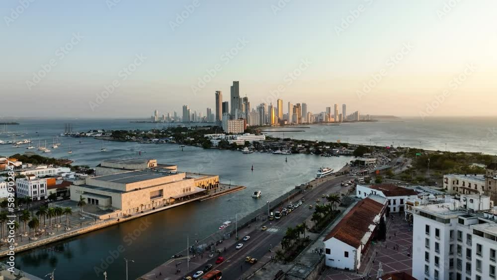 Aerial view rising over streets of Centro, towards the Bocagrande skyline, sunset in Cartagena, Colombia Aerial view rising over streets of Centro, towards the Bocagrande skyline, sunset in Cartagena, Colombia