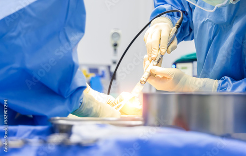 Fotografie Doctor or surgeon in blue uniform inside operating room in hospital did orthopedic surgery