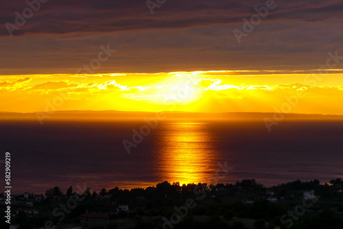 Greek Seaside Sunset: An Idyllic Moment