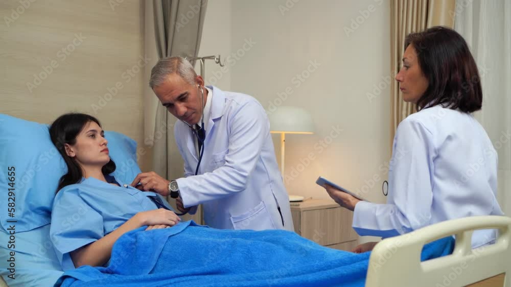 Senior doctor wearing uniform with stethoscope service help support discussing and consulting talk to sick woman patient about checkup result information in hospital Senior doctor wearing uniform with stethoscope service help support discussing and consulting talk to sick woman patient about checkup result information in hospital