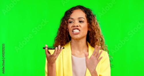 Speaker, phone call and angry woman on green screen while arguing, annoyed and whatever gesture in studio. Voice to text, smartphone and woman recording on app while frustrated, breakup and crisis photo